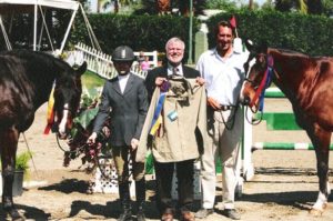 Stephanie Danhakl with Bellingham Bay and Henley owned by Montana Coady 2003 HITS Desert Circuit Champions Small and Large Junior Hunters Photo Cathrin Cammett