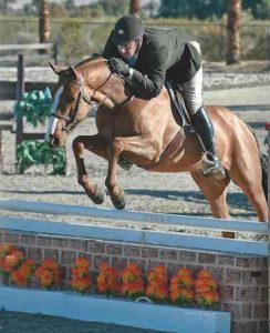 Archie Cox and Emma Gerbers Cheers PreGreen Hunter 2015 HITS Desert Circuit Photo ESI