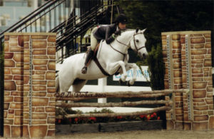 Skylar Nelson and Macy Grey owned by Wild Sky Farm Medium Pony Hunters 2010 Devon Horse Show Photo JL Parker