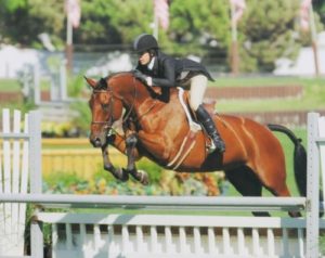 Shelby Wakeman and My Cap owned by Archie Cox (pictured here – Kim McCormack) Zone 10 Champion Small Junior 16-17 2007 USEF National Junior Hunter Finals West Coast Photo by Jumpshot