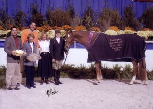 Joie Gatlin and Mandarin owned by Jane Fraze Grand Hunter Champion Champion Regular Working Hunters 2004 Washington International Photo Al Cook