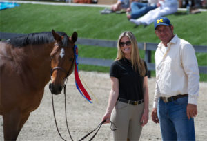 Montana Coady and Archie Cox with Winnetoe Champion Amateur Owner Hunter 18-35 2013 HITS Desert Circuit Photo Alden Corrigan