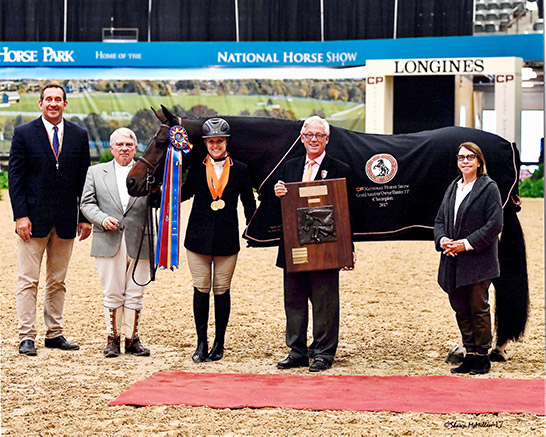 Virginia Fout and Carma 2017 National Horse Show Amateur Owner Hunter 3'3" 36 & Over, Champion Photo by McMillen