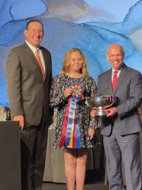 Archie Cox, Violet Tatum, and Bill Moroney Violet Tatum and Valedictorian 2021 USEF National Champion