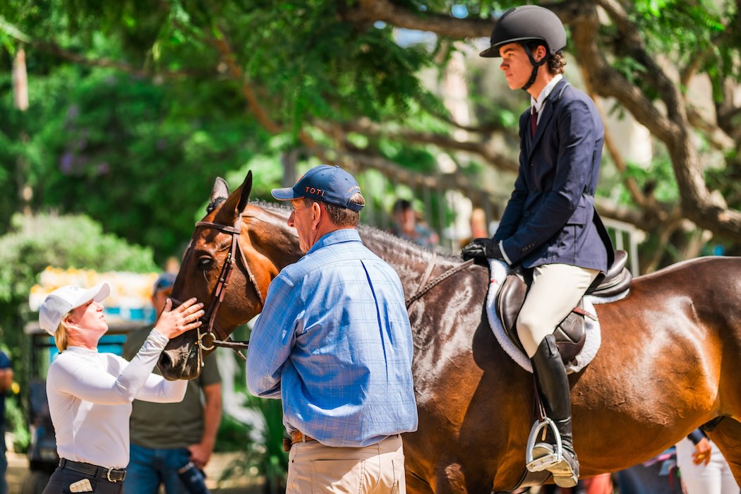 Dane Anson and Celestino, with Archie Cox and Karli Postel Champion Gladstone Equitation Challenge - West 2025 Adequan/USEF Junior Hunter National Championship - West Del Mar, California Photo by Captured Moment