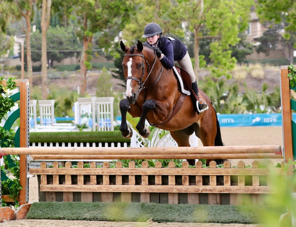 Eva Lipman and Mercator E' Champion, Large Junior Hunter 3'3" 2025 HITS Del Mar Summer Festival 2 Photo by High Desert